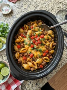Cheesy Slow Cooker Taco Pasta Shells