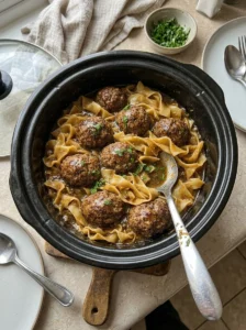 Slow Cooker Meatballs Egg Noodles in Rich Brown Gravy